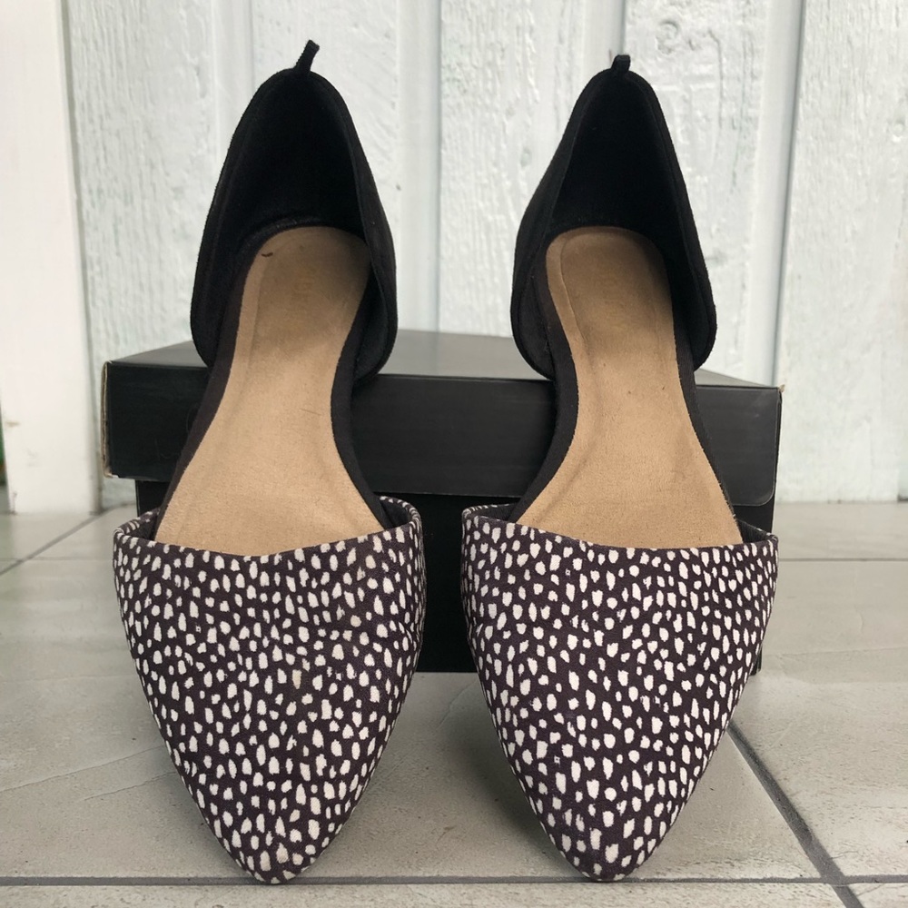 Black and white faux suede flats